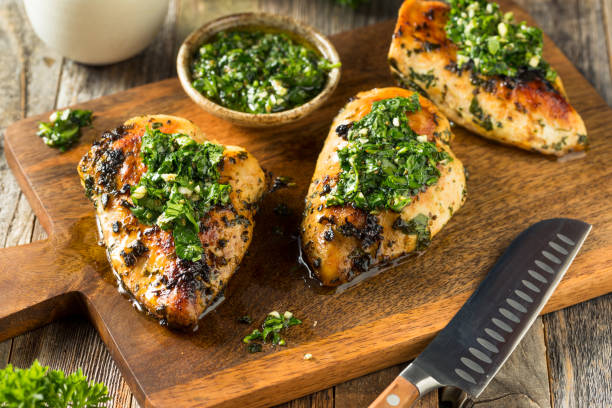 Homemade Grilled Chimichurri Chicken Breast Homemade Grilled Chimichurri Chicken Breast Ready to Eat chimichurri stock pictures, royalty-free photos & images