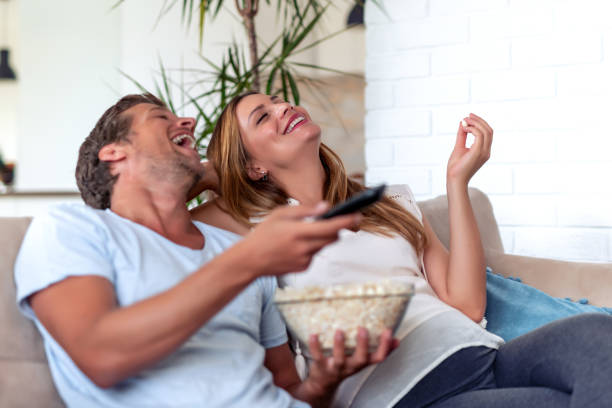 istock Happy couple enjoying in their home 1155964316