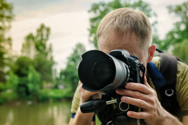 istock The photographer is focusing. 1155967875