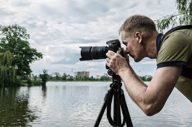 istock The photographer is focusing. 1155967879