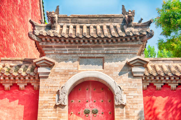 Shaolin Temple Architectural roof Details A chinese architecture gate leading into Shaolin Temple in Dengfeng City, Henan Province China. shaolin monastery stock pictures, royalty-free photos & images