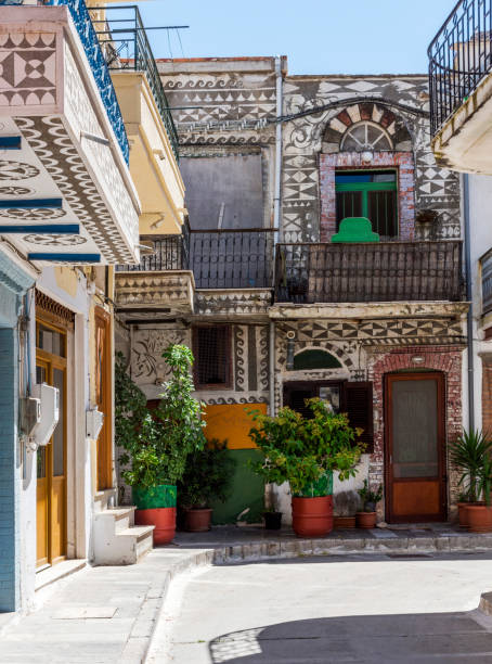 istock Traditional houses decorated with the famous geometric scratch patterns in the medieval mastic village of Pyrgi on the island of Chios, Greece 1155969843