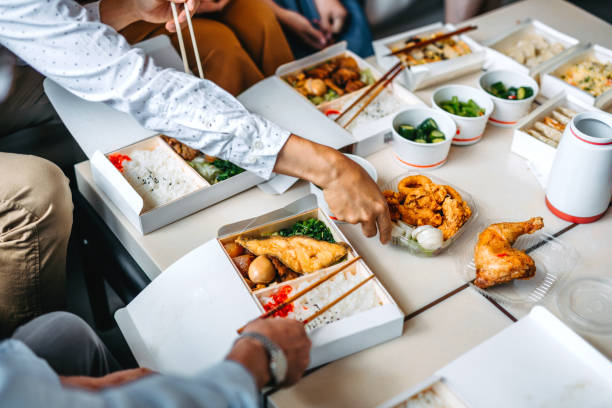istock Family eating takeout food 1155971107