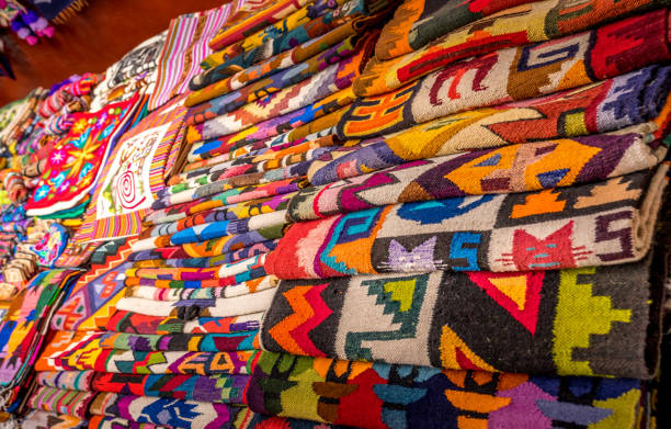 istock Peruvian traditional colourful native handicraft textile fabric at market in Peru 1155974011