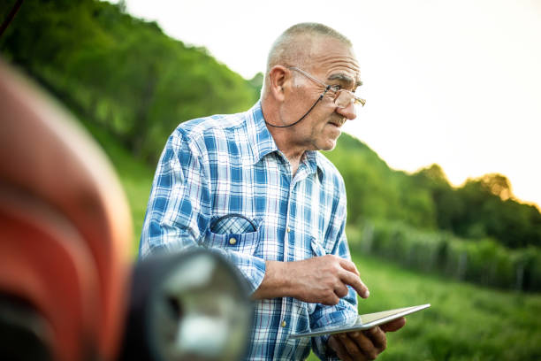 istock The farmer is preparing to work in the field 1155974556