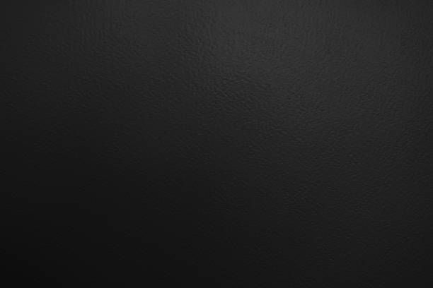 istock black painted cement abstract background textured wall 1155974771