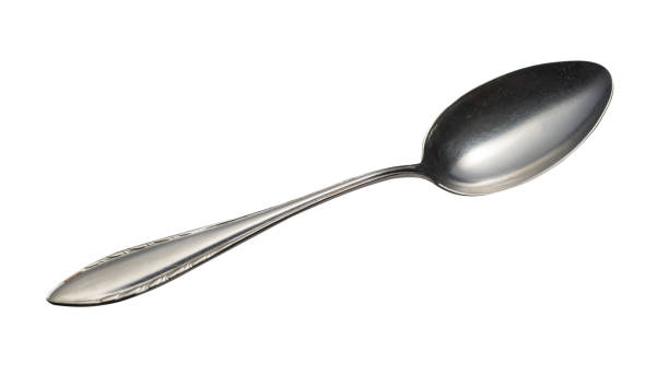 istock spoon isolated on white background. metal spoon. vintage spoon. 1155975891