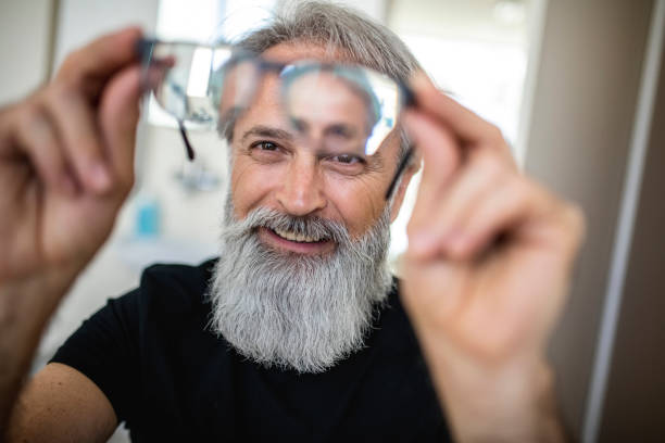 istock Mature man testing out new glasses 1155975999