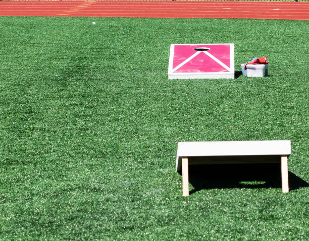 istock Two cornhole games across from the other 1155979887