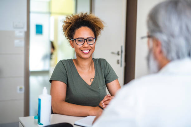 istock Woman testing out her new eyeglasses in ophthalmology office 1155980518