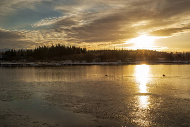 istock Sunset in Heidmork lake, Iceland 1155981081
