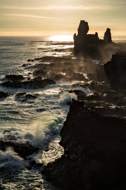 istock Londrangar in Snaefellsnes peninsula at sunset, Iceland 1155981085