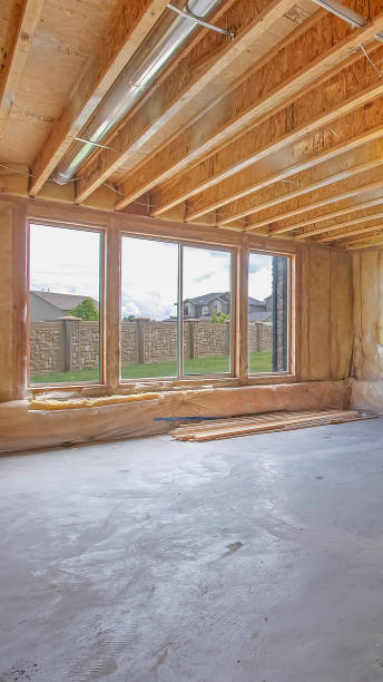 istock Vertical frame Unfinished house interior with air conditioning ducts and glass windows and door 1155982695