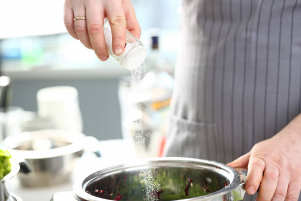 Chef Fingers Putting Saucepan White Sea Salt