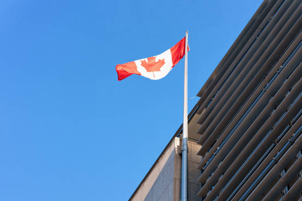 istock Modern building with Canadian flag on Potsdamer Platz 1155988423