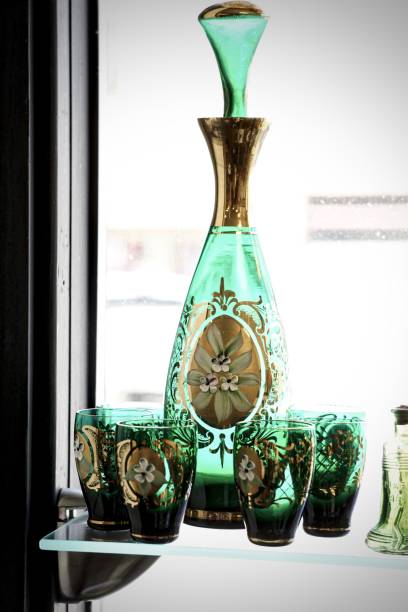 istock old glass decanter and drinking glasses 1155998137
