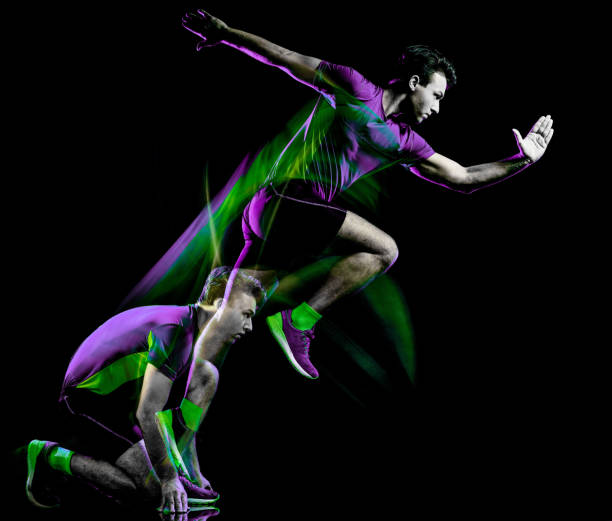 istock runner running jogger jogging man isolated light painting black background 1155999632