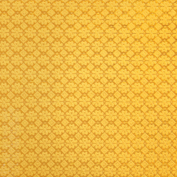 istock gold guipure, embroidery on cloth texture 1156012699