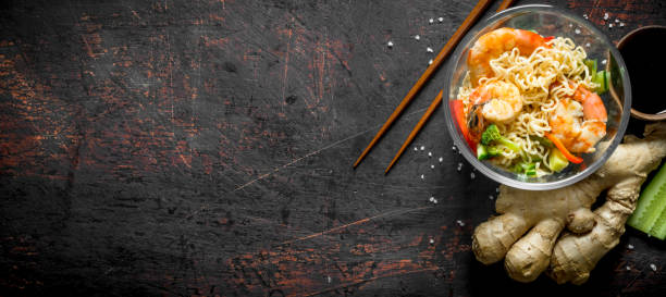 istock Instant noodles with vegetables, shrimp and fresh ginger. 1156013011