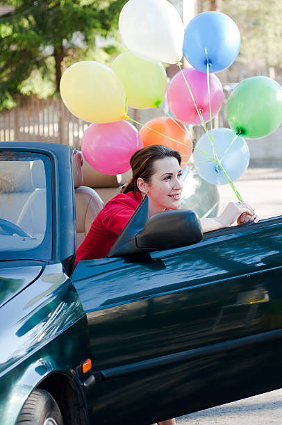 istock Beautiful brunette woman in car 115601692