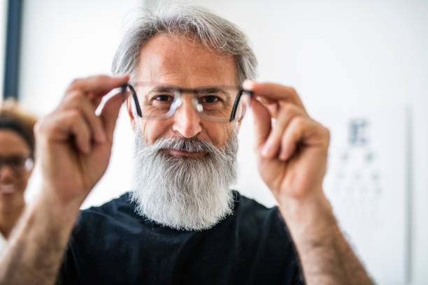 istock Man testing out his new eyeglasses in ophthalmology office 1156020587