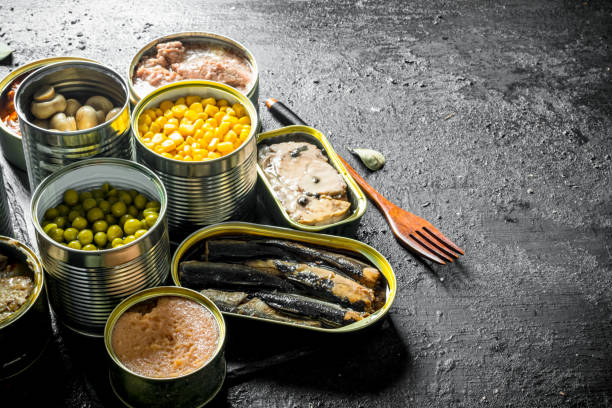 istock Canned food in open cans. 1156024284