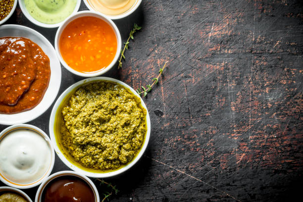 istock Different types of sauces in bowls. 1156026206