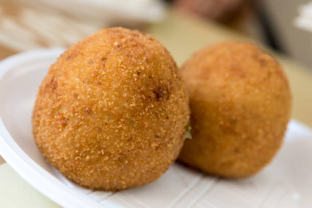 istock Tasty Sicilian arancini closeup 1156026342