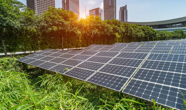 istock solar panel plant with urban landscape landmarks,Ecological energy renewable concept 1156032159