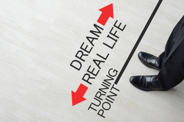 istock Business man thinking about dream or real life 1156037700