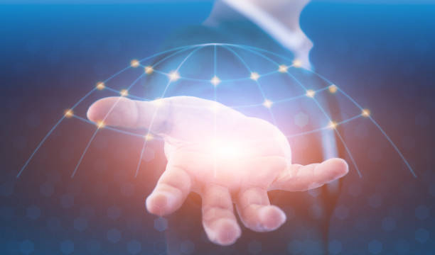 istock Businessman holding global network and data exchanges over the world. Technologies connecting the world. Businessman in suit holding global connection symbol on his hand 1156040205