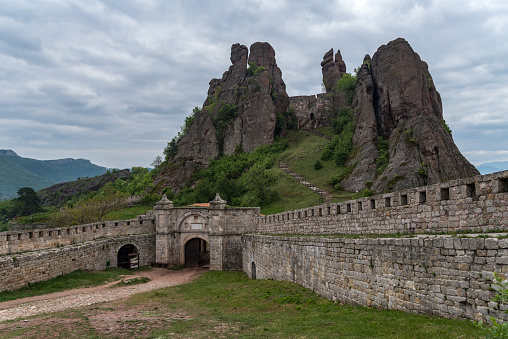 Belogradchik , Bulgaria - May 9, 2019:  Gate of the fortress Kaleto and the Belogradchik rocks, Bulgaria