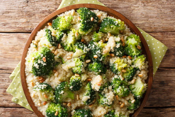 istock Homemade broccoli salad with quinoa and pine nuts closeup on the table. horizontal top view 1156046344