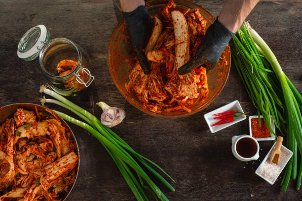 Person preparing Kimchi