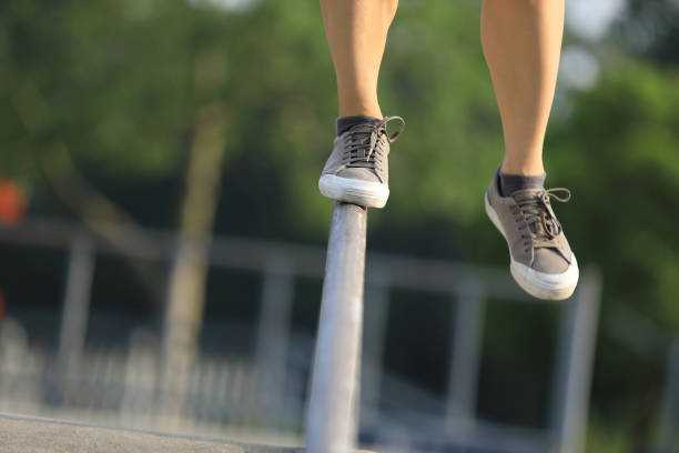 Legs walking on steel pipe with balance