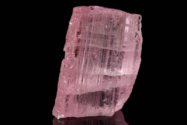 istock Macro tourmaline mineral stone on black 1156058522