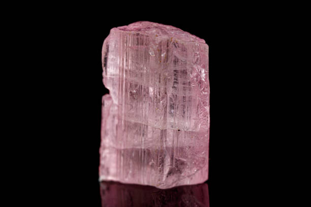 istock Macro tourmaline mineral stone on black 1156058625