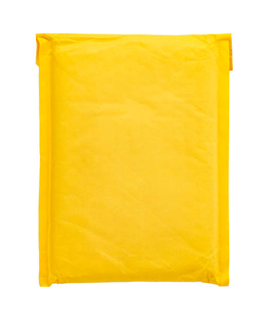 yellow postal bag for packing parcels. Isolated on white background.
