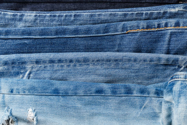 istock many denim blue jeans background. 1156058923