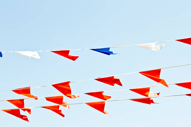 istock Orange flags at queensday in the Netherlands 115605933