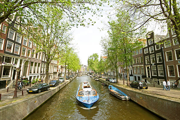 istock Cruising through Amsterdam canals in the Netherlands 115605979