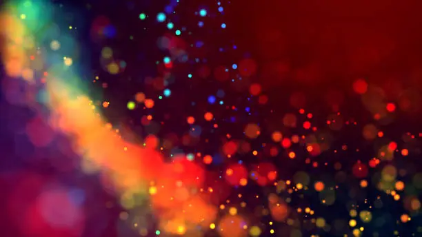 Photo of cloud of multicolored particles in the air like sparkles on a dark background with depth of field. beautiful bokeh light effects with colored particles. background for holiday presentations. 10