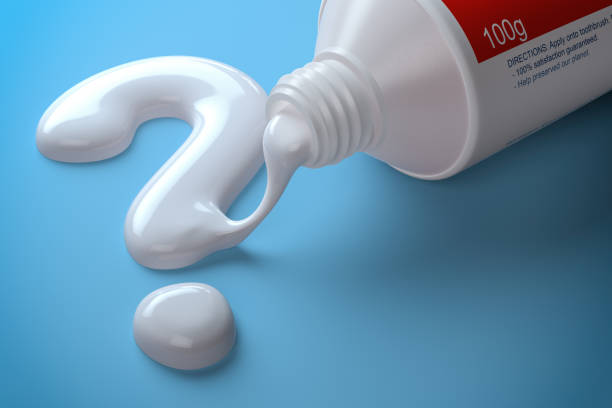 Toothpaste in the shape of question mark coming out from toothpaste tube. Brushing teeth dental concept. Toothpaste in the shape of question mark coming out from toothpaste tube. Brushing teeth dental concept. 3d illustration toothpaste stock pictures, royalty-free photos & images