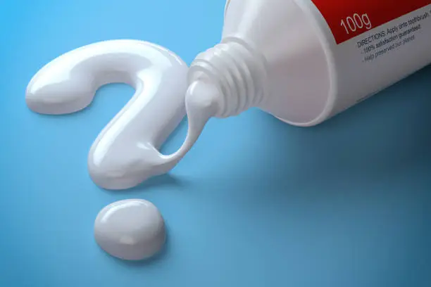 Toothpaste in the shape of question mark coming out from toothpaste tube. Brushing teeth dental concept. 3d illustration