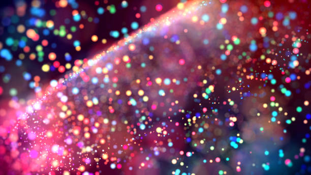 istock cloud of multicolored particles in the air like sparkles on a dark background with depth of field. beautiful bokeh light effects with colored particles. background for holiday presentations. 69 1156063190