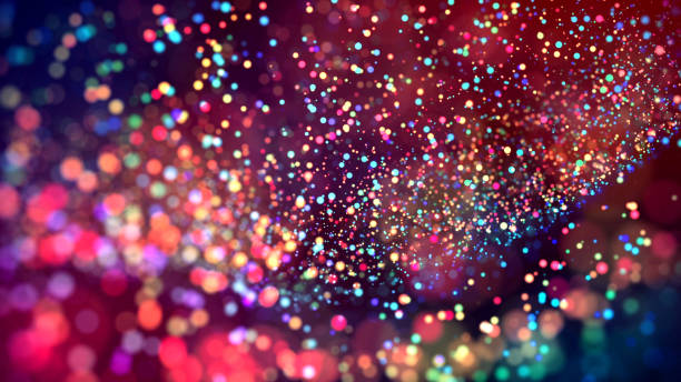 cloud of multicolored particles in the air like sparkles on a dark background with depth of field. beautiful bokeh light effects with colored particles. background for holiday presentations. 102 - polychromatic imagens e fotografias de stock