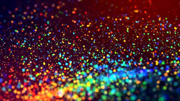 istock cloud of multicolored particles in the air like sparkles on a dark background with depth of field. beautiful bokeh light effects with colored particles. background for holiday presentations. 124 1156063577