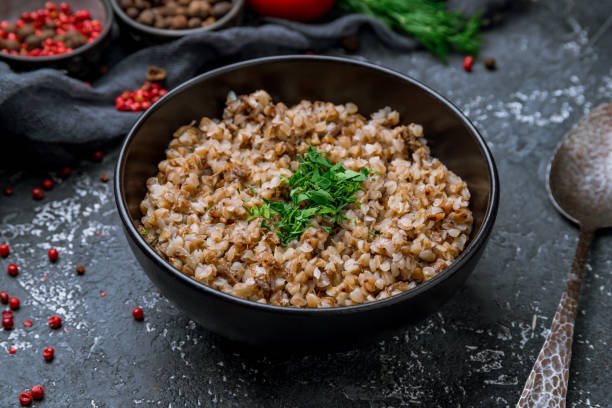 istock boiled buckwheat porridge on black bowl 1156073539