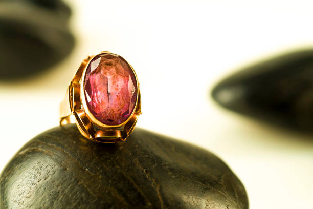istock A ring with a sapphire on black stones 1156074217