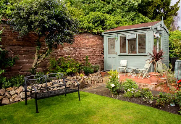 Home pub in a pretty residential garden